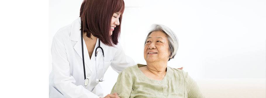 a female doctor and her elderly patient