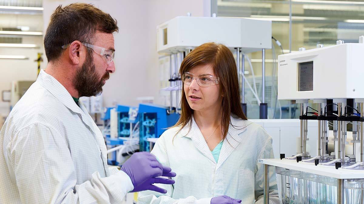 Two scientists working together in a lab