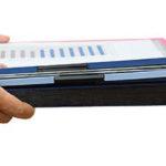 Handing over a stack of papers