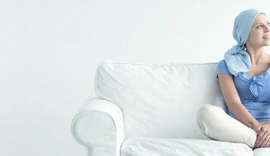 woman sitting on a white couch