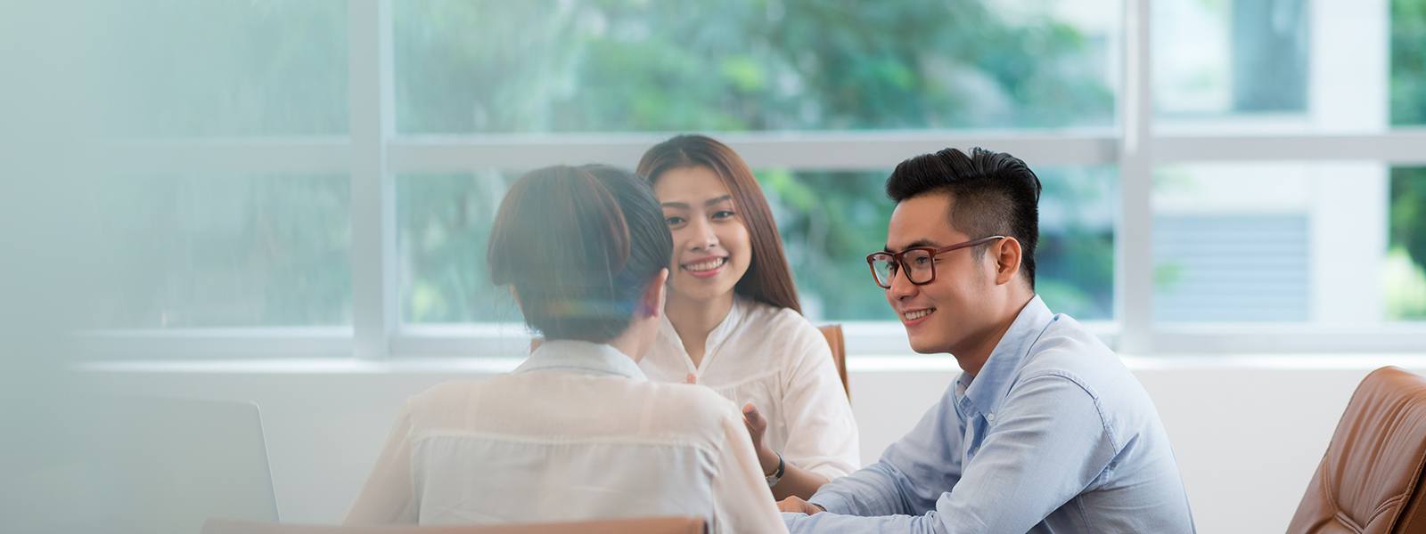 three colleagues having a discussion