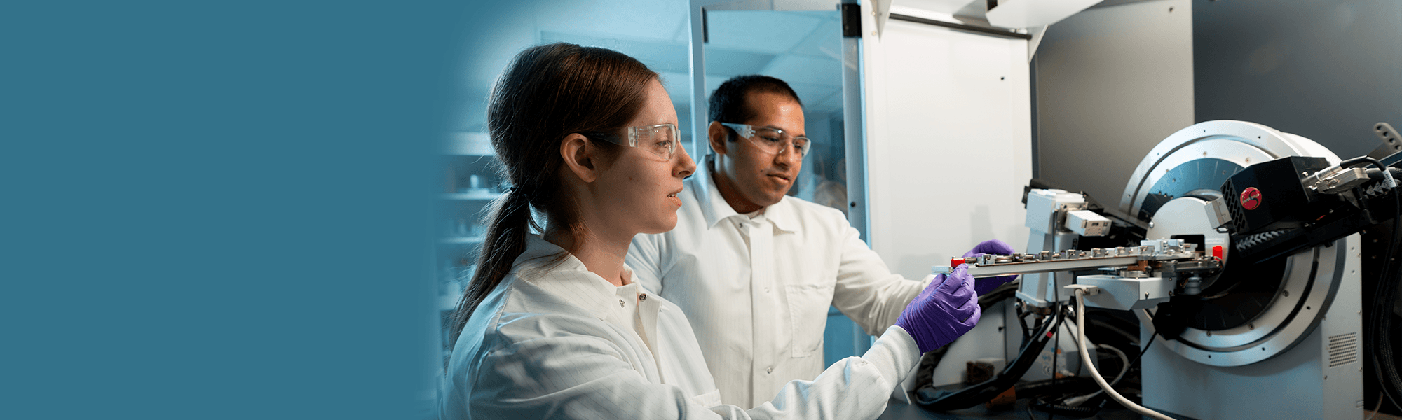 two lab technicians performing a lab test