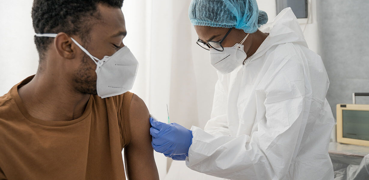 patient receiving vaccine shot
