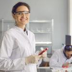 Happy, smiling laboratory scientist