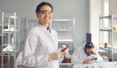 Happy, smiling laboratory scientist