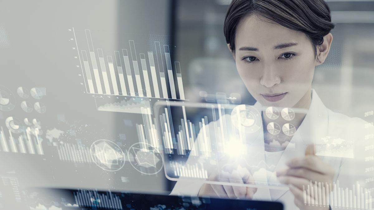 Female scientist interacting with data visualizations