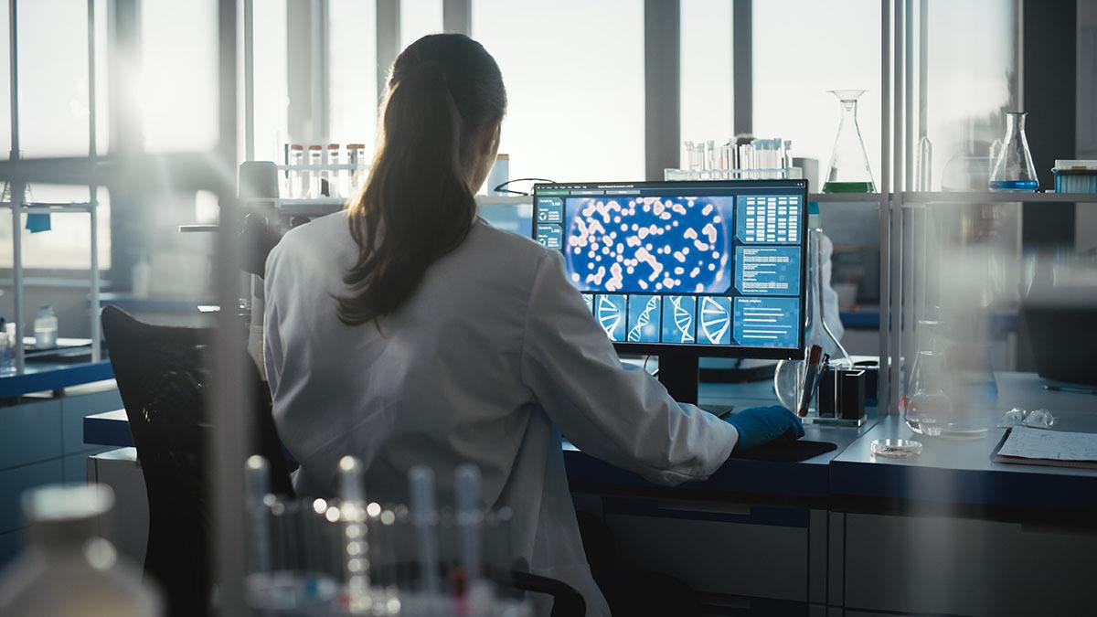 Scientist at a computer in a laboratory