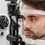 Man getting examined for ophthalmology clinical research