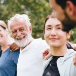 A smiling, diverse group of patients