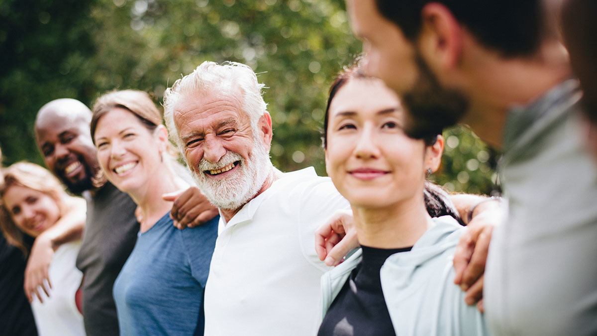 A smiling, diverse group of patients