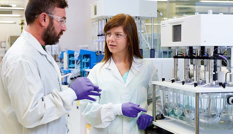 GMP Laboratory services technicians speaking