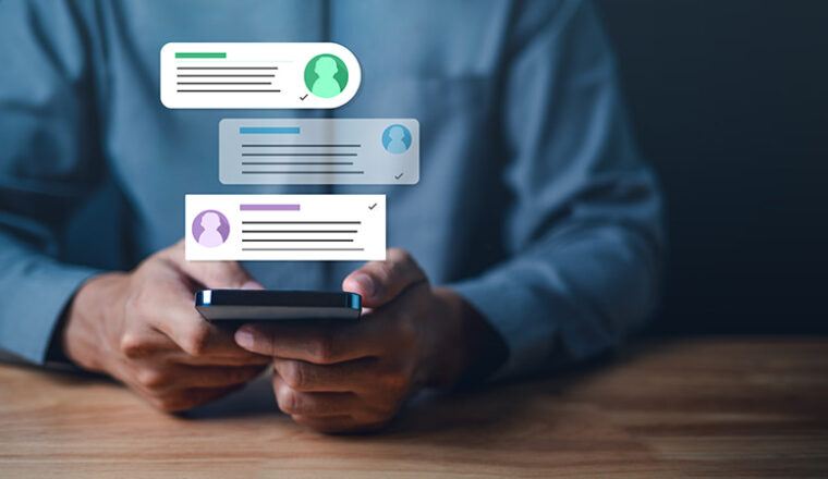 Man using a mobile phone receiving notifications