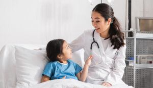 Pediatrician speaking to a child patient