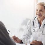 Psychiatric expert speaks to a clinical trial recruit