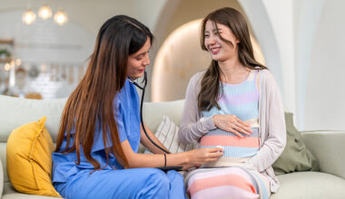 Pregnant female being examined by pregnancy registries physician