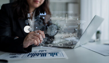 Female professional reading The 2026 state of FSP outsourcing report